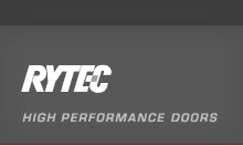 The logo of rytec high performance doors with gray background